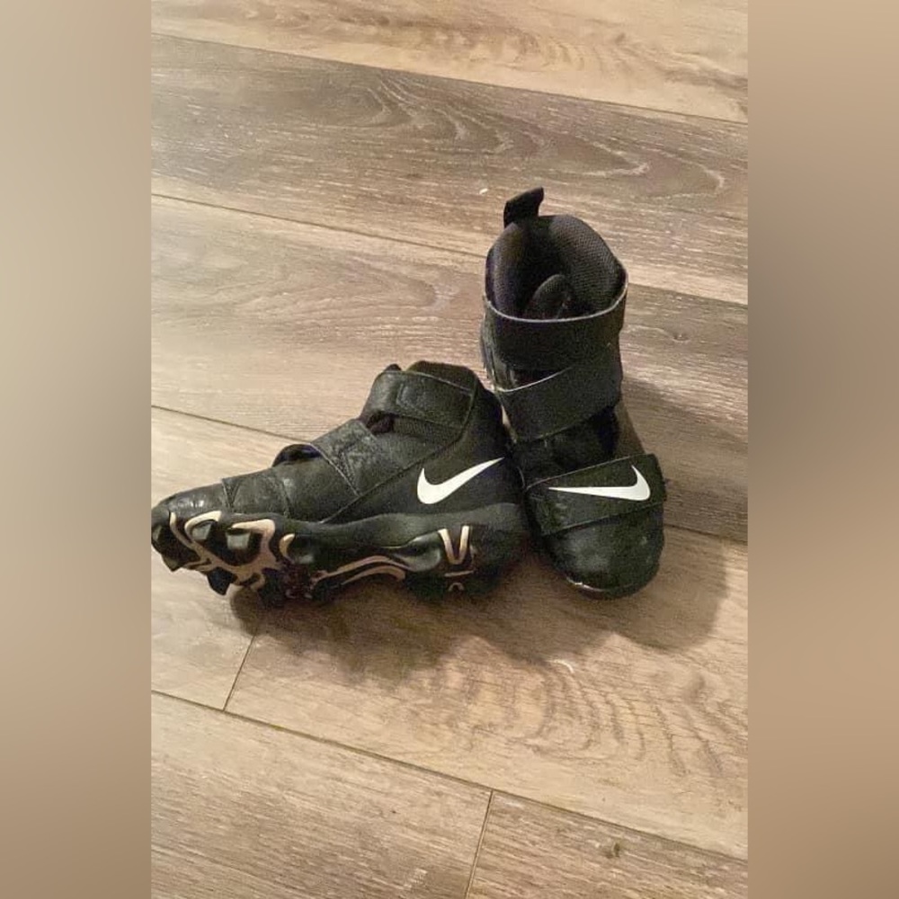 Boys size 13 football cleats.